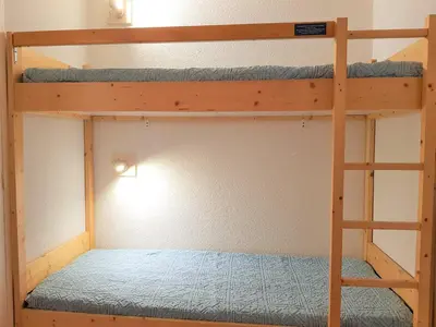 Un ou plusieurs lits superposés dans un hébergement de l'établissement Studio fonctionnel pour 5 personnes à Arc 2000 - FR-1-411-360