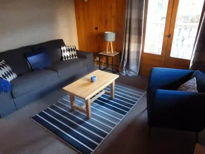 Coin salon dans l'établissement Chalet Le Cordava