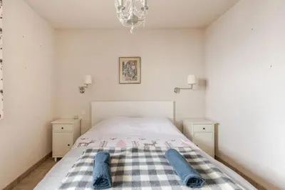 Un ou plusieurs lits dans un hébergement de l'établissement Chalet confortable avec vue sur la montagne à Peisey-Nancroix