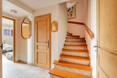 Un ou plusieurs lits dans un hébergement de l'établissement Chalet confortable avec vue sur la montagne à Peisey-Nancroix