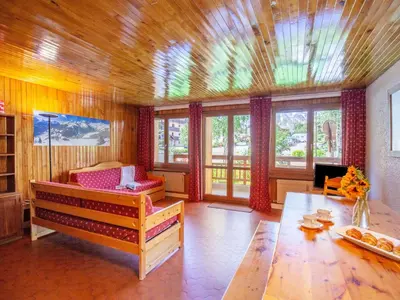 Coin salon dans l'établissement Apartment Les Grandes Balmes I et II - Le Lac-10 by Interhome