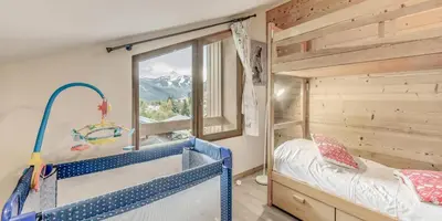 Un ou plusieurs lits dans un hébergement de l'établissement Chalet Le Serac - Chalets pour 10 Personnes MAE-3287