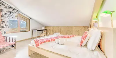 Un ou plusieurs lits dans un hébergement de l'établissement Chalet Le Serac - Chalets pour 10 Personnes MAE-3287