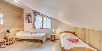 Un ou plusieurs lits dans un hébergement de l'établissement Chalet Le Serac - Chalets pour 10 Personnes MAE-3287