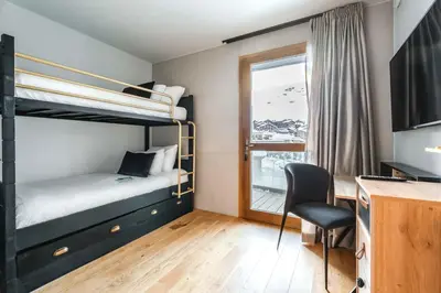 Un ou plusieurs lits dans un hébergement de l'établissement Hôtel Le Diamond Rock