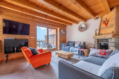 Coin salon dans l'établissement Chalet Solize - Terrasse avec superbe vue - Sauna
