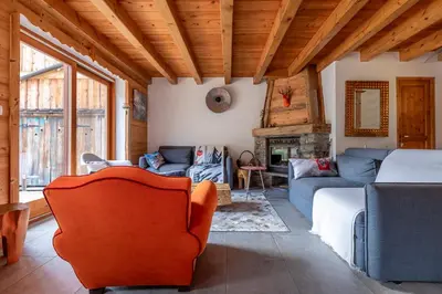 Coin salon dans l'établissement Chalet Solize - Terrasse avec superbe vue - Sauna