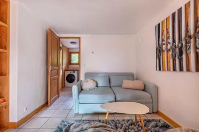 Coin salon dans l'établissement Chalet Solize - Terrasse avec superbe vue - Sauna