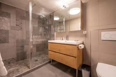 Salle de bains dans l'établissement Chalet Solize - Terrasse avec superbe vue - Sauna