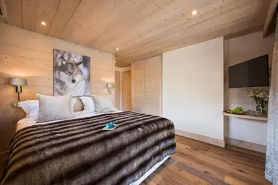 Un ou plusieurs lits dans un hébergement de l'établissement Chalet Opale