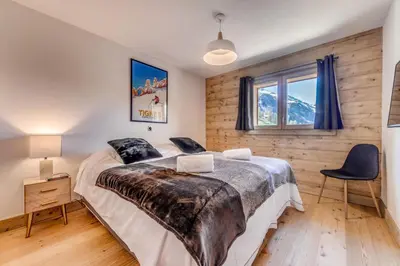 Un ou plusieurs lits dans un hébergement de l'établissement Résidence Lodge Des Neiges C - Appartement 4 - pied de pistes, service hotelier inclus MAE-2566