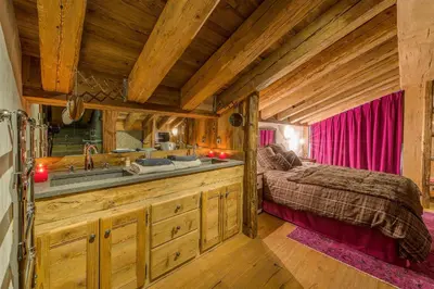 Un ou plusieurs lits dans un hébergement de l'établissement Madame Vacances Le Chalet Denali