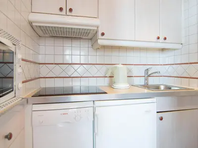 Cuisine ou kitchenette dans l'établissement Appartement 2 pièces avec Wifi à 500m des pistes - Tignes - FR-1-449-121