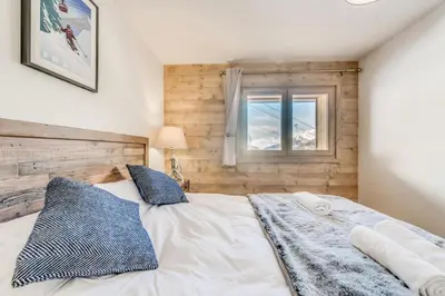 Un ou plusieurs lits dans un hébergement de l'établissement Résidence Lodge Des Neiges C - Appartement 4 - pied de pistes, service hotelier inclus MAE-2579