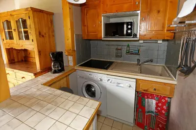 Cuisine ou kitchenette dans l'établissement le burel 5 personnes