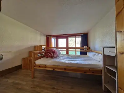 Un ou plusieurs lits dans un hébergement de l'établissement Duplex skis aux pieds pour 5 pers. à Arc 1800 avec WIFI et animaux admis - FR-1-411-119