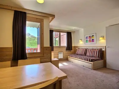 Coin salon dans l'établissement Grand appartement 6 personnes avec vue, proche des pistes - FR-1-455-173