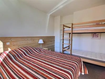 Un ou plusieurs lits dans un hébergement de l'établissement Grand appartement 6 personnes avec vue, proche des pistes - FR-1-455-173