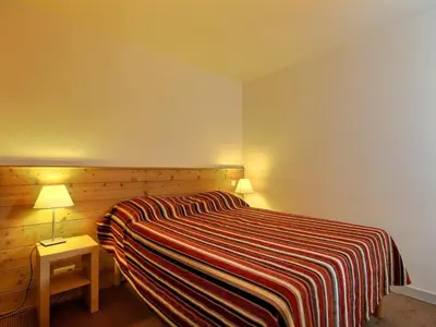Un ou plusieurs lits dans un hébergement de l'établissement Appartement spacieux 2 pièces près des pistes, 4 pers. - FR-1-455-175