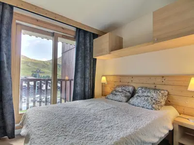 Un ou plusieurs lits dans un hébergement de l'établissement Bel appartement 2 pièces 4/5 pers, 2 balcons, proche pistes - FR-1-455-177