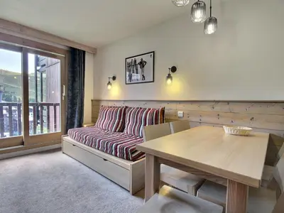 Coin salon dans l'établissement Bel appartement 2 pièces 4/5 pers, 2 balcons, proche pistes - FR-1-455-177
