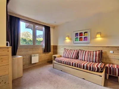 Coin salon dans l'établissement Duplex cosy 4 pers. orienté sud, accès rapide pistes - FR-1-455-178