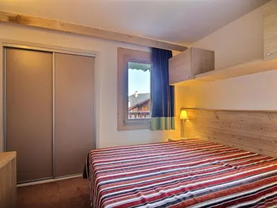 Un ou plusieurs lits dans un hébergement de l'établissement Spacieux 2 pièces à Belle Plagne, 4 pers, balcon, proche pistes - FR-1-455-176