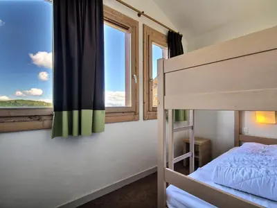 Un ou plusieurs lits dans un hébergement de l'établissement Grand duplex 6/7 personnes proche pistes à Belle Plagne - FR-1-455-181