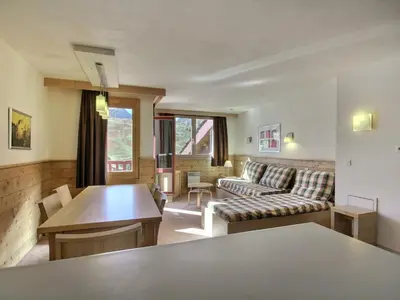 Coin salon dans l'établissement Grand duplex 6/7 personnes proche pistes à Belle Plagne - FR-1-455-181