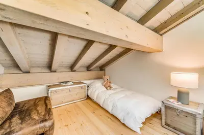 Un ou plusieurs lits dans un hébergement de l'établissement Résidence Lodge Des Neiges C - Appartment 4 - pied de pistes, service hotelier inclus MAE-2582