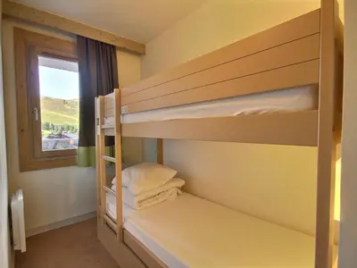 Un ou plusieurs lits dans un hébergement de l'établissement Studio-cabine à Belle Plagne, proche pistes, pour 4 pers - FR-1-455-198