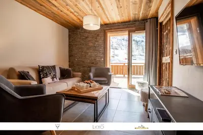 Coin salon dans l'établissement MARMOTTE 004 - Charmant appartement pour 6, aux pieds des pistes