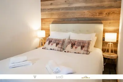 Un ou plusieurs lits dans un hébergement de l'établissement MARMOTTE 004 - Charmant appartement pour 6, aux pieds des pistes