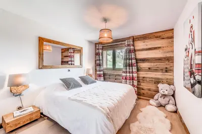 Un ou plusieurs lits dans un hébergement de l'établissement Résidence Lodge Des Neiges C - Appartement 4 pied de pistes, service hotelier inclus MAE-2581