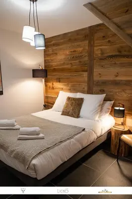 Un ou plusieurs lits dans un hébergement de l'établissement MARMOTTE 204 - Charmant appartement mansardé, aux pieds des pistes