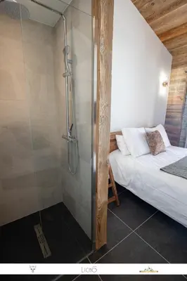 Un ou plusieurs lits dans un hébergement de l'établissement MARMOTTE 204 - Charmant appartement mansardé, aux pieds des pistes