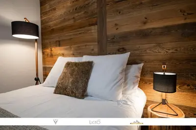 Un ou plusieurs lits dans un hébergement de l'établissement MARMOTTE 204 - Charmant appartement mansardé, aux pieds des pistes