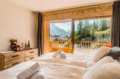 Un ou plusieurs lits dans un hébergement de l'établissement Résidence Lodge Des Neiges C - Appartement 4 - pied de pistes, service hotelier inclus MAE-4482