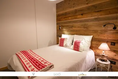 Un ou plusieurs lits dans un hébergement de l'établissement MARMOTTE 201 - Bel appartement mansardé, aux pieds des pistes