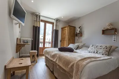 Un ou plusieurs lits dans un hébergement de l'établissement Hotel la Turra