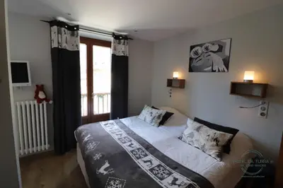 Un ou plusieurs lits dans un hébergement de l'établissement Hotel la Turra