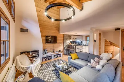 Coin salon dans l'établissement Chalet Breckenridge Sud - Chalet 4 - 129m2 - 6 chambres, 6 salles de bain MAE-4883
