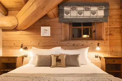 Un ou plusieurs lits dans un hébergement de l'établissement Madame Vacances Le Chalet Arosa