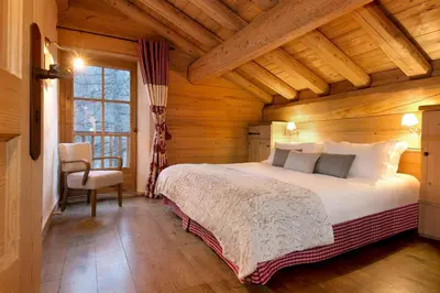 Un ou plusieurs lits dans un hébergement de l'établissement Madame Vacances Le Chalet Arosa