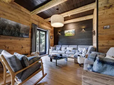 Coin salon dans l'établissement Chalet de Charme 200m² à Val d'Isère avec Sauna et Bain Nordique - FR-1-567-5