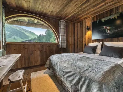 Un ou plusieurs lits dans un hébergement de l'établissement Chalet de Luxe à Val d'Isère avec Jacuzzi et Hammam - FR-1-567-8