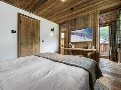 Un ou plusieurs lits dans un hébergement de l'établissement Chalet de Luxe à Val d'Isère avec Jacuzzi et Hammam - FR-1-567-8