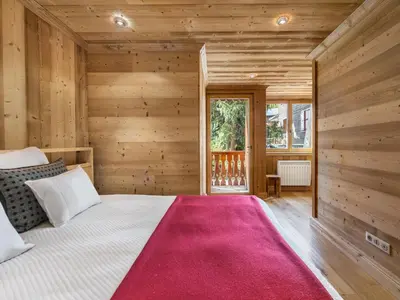 Un ou plusieurs lits dans un hébergement de l'établissement Appartement familial à Val-d'Isère avec terrasse et parking - FR-1-567-29