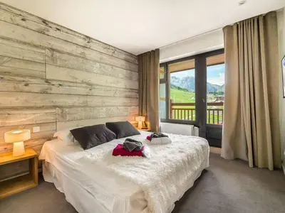 Un ou plusieurs lits dans un hébergement de l'établissement Appartement luxueux 75m², 6 pers, centre Val d'Isère, front de neige, terrasse sud - FR-1-567-22
