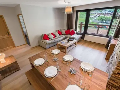 Coin salon dans l'établissement Appartement luxueux 75m², 6 pers, centre Val d'Isère, front de neige, terrasse sud - FR-1-567-22